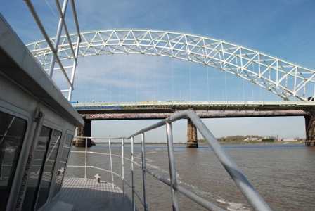 Boat passing Runcorn Bridge