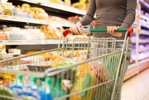 A woman with a shopping trolley