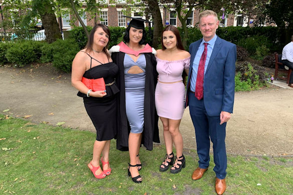 Sophie McLoughlin with her parents and sister