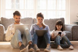 family on laptops