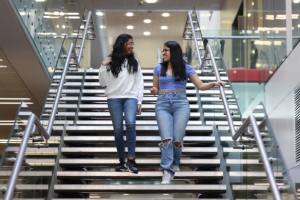 Students walking down stairs