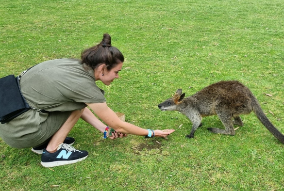 Clarissa Giebel feeding a small kangaroo