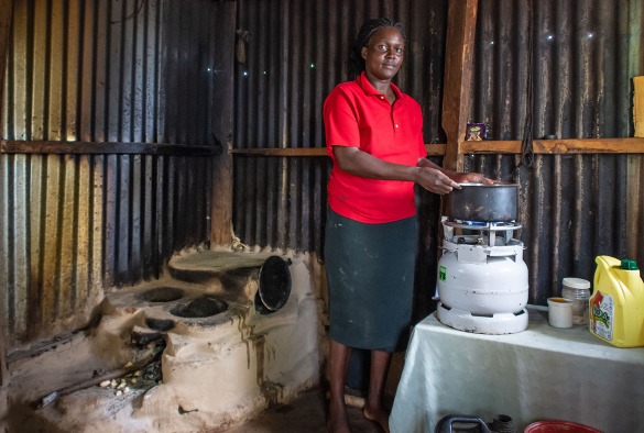 Woman uses liquefied petroleum gas to cook