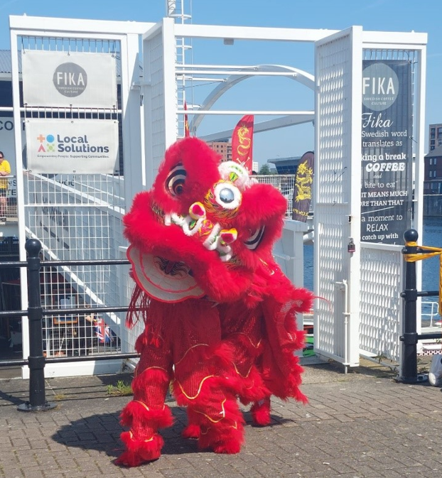A red Chinese dragon by the Liverpool watersport centre