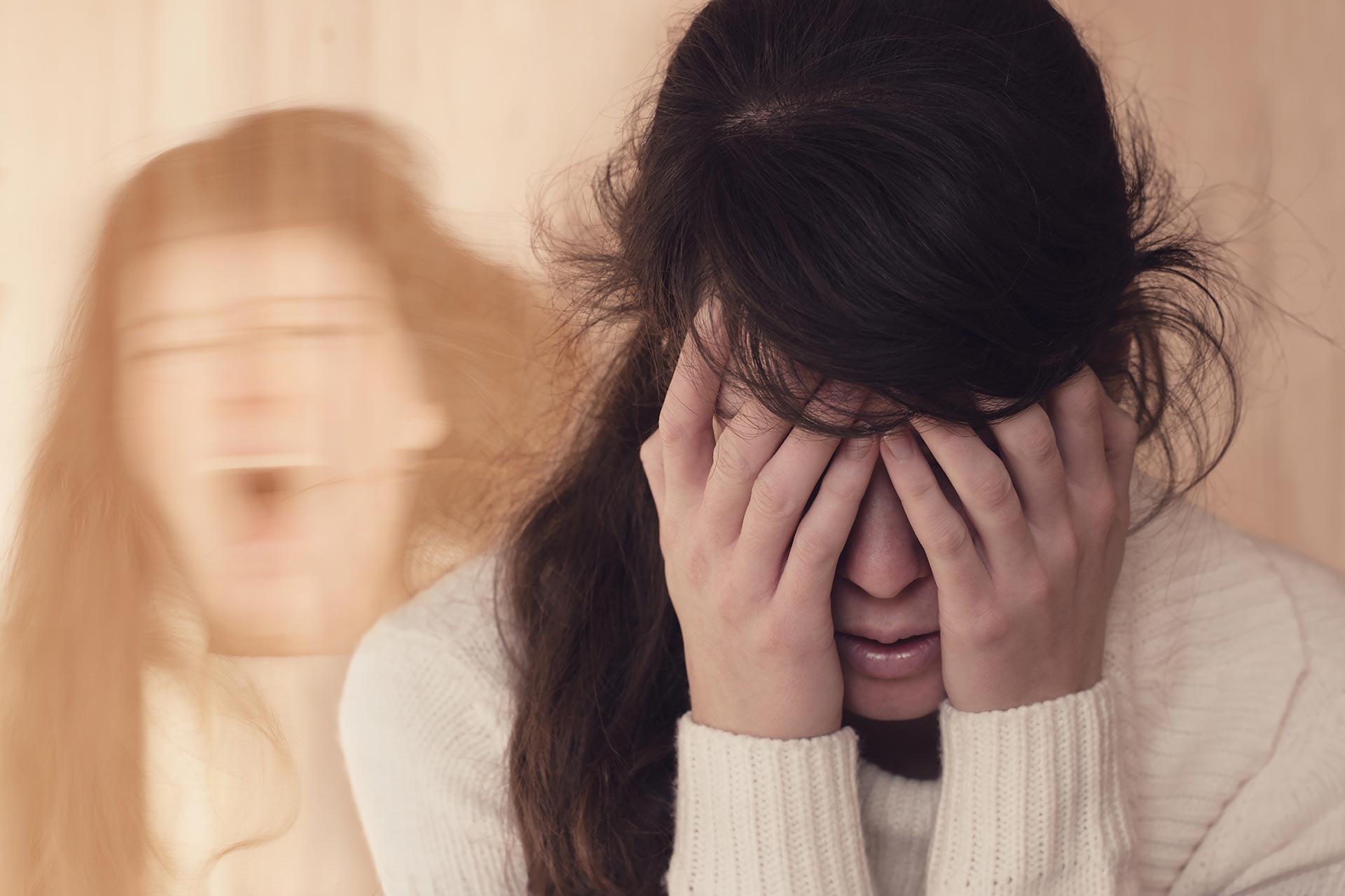 Emotional portrait of woman suffering from mental disorder (schizophrenia or Dissociative identity disorder) - stock photo
