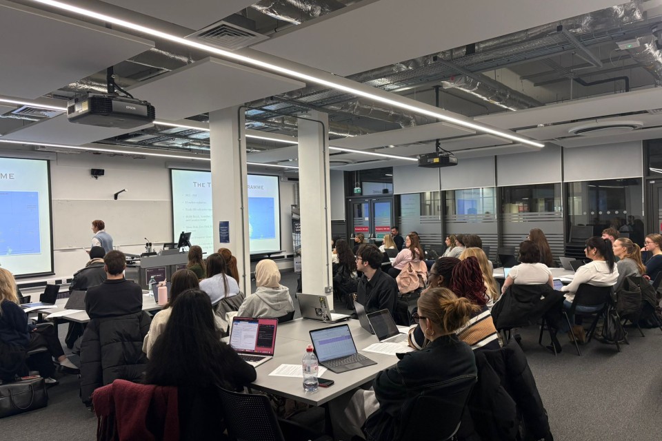 Students looking at evidence in classroom setting